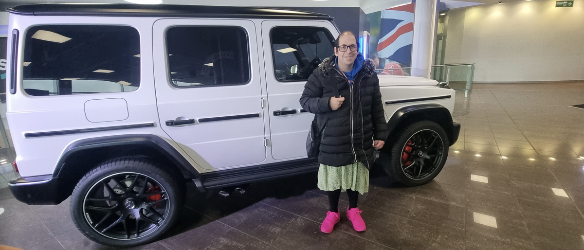 Simon in front of a G Wagon